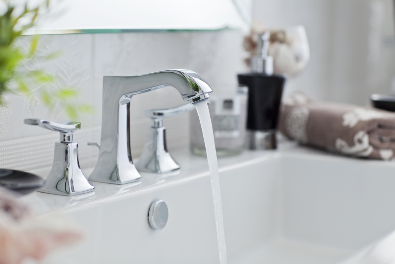 Modern bathroom faucet; Shutterstock ID 64842238; purchase_order: Improve Water Slide; job: 